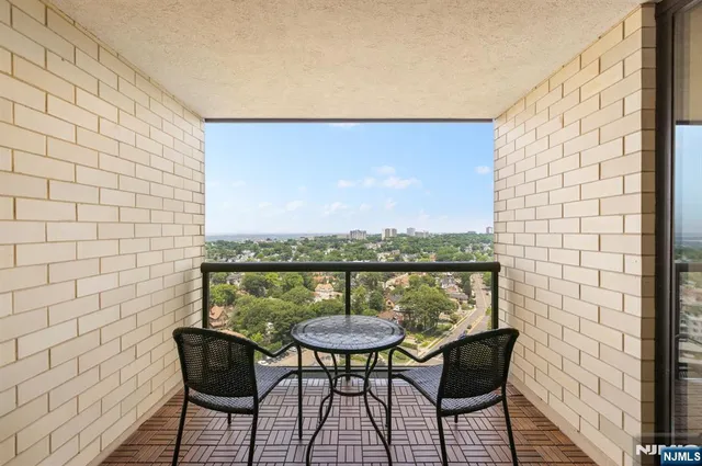 a view of a chairs and table on the terrace