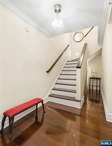 a view of entryway with wooden floor
