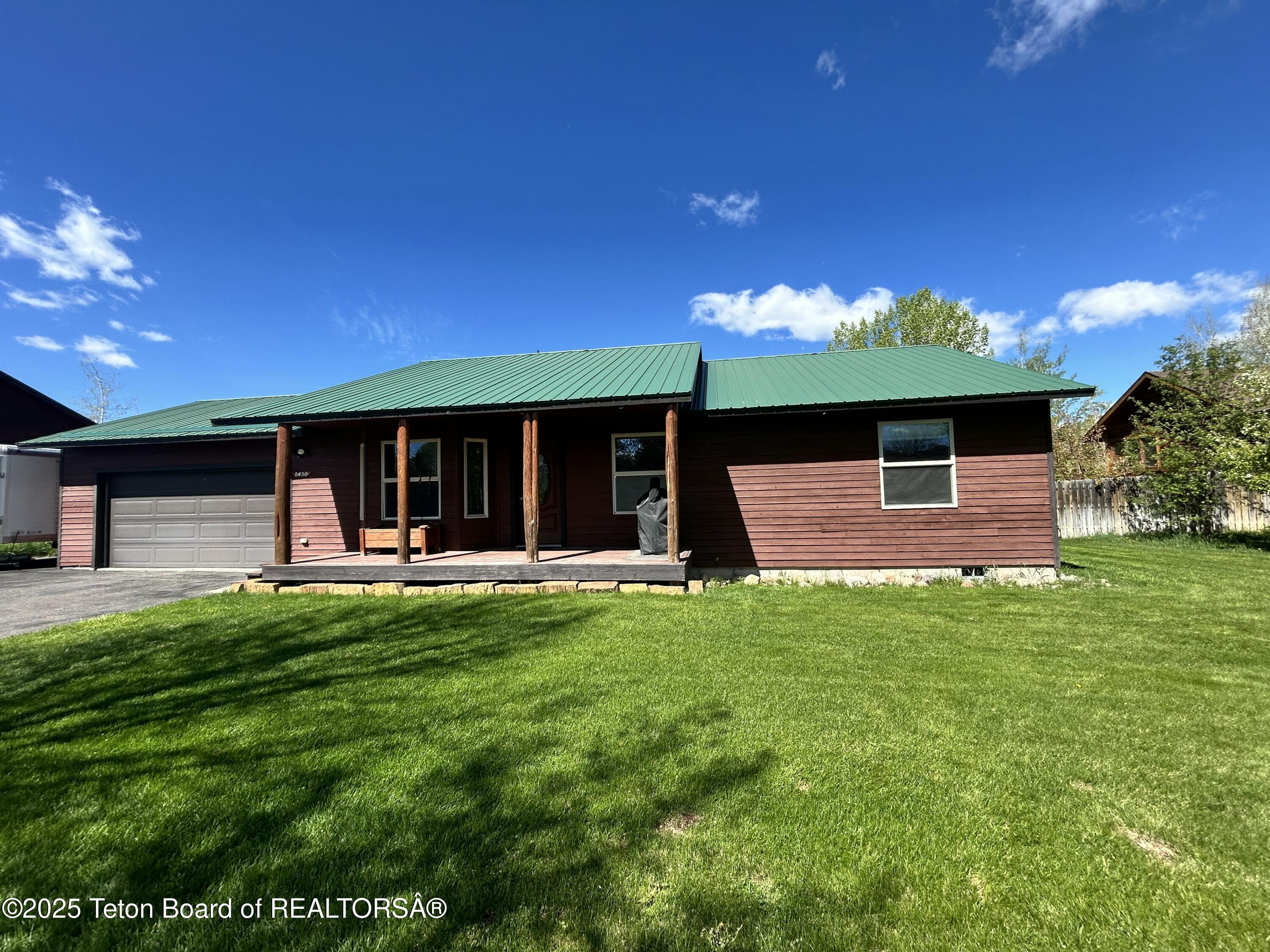 8450 Red Hawk Trail Victor, ID 83455 - Photo 1 of 1 1 main front summer