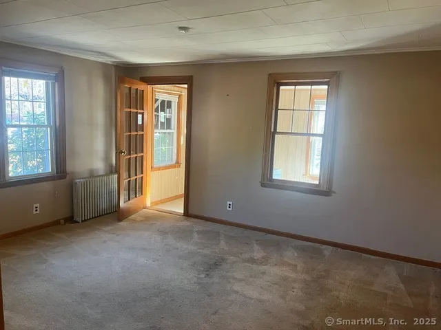 an empty room with windows