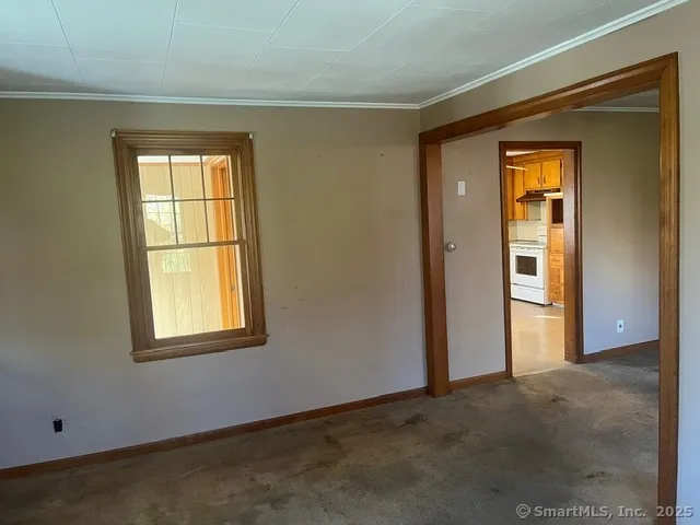 an empty room that has a window