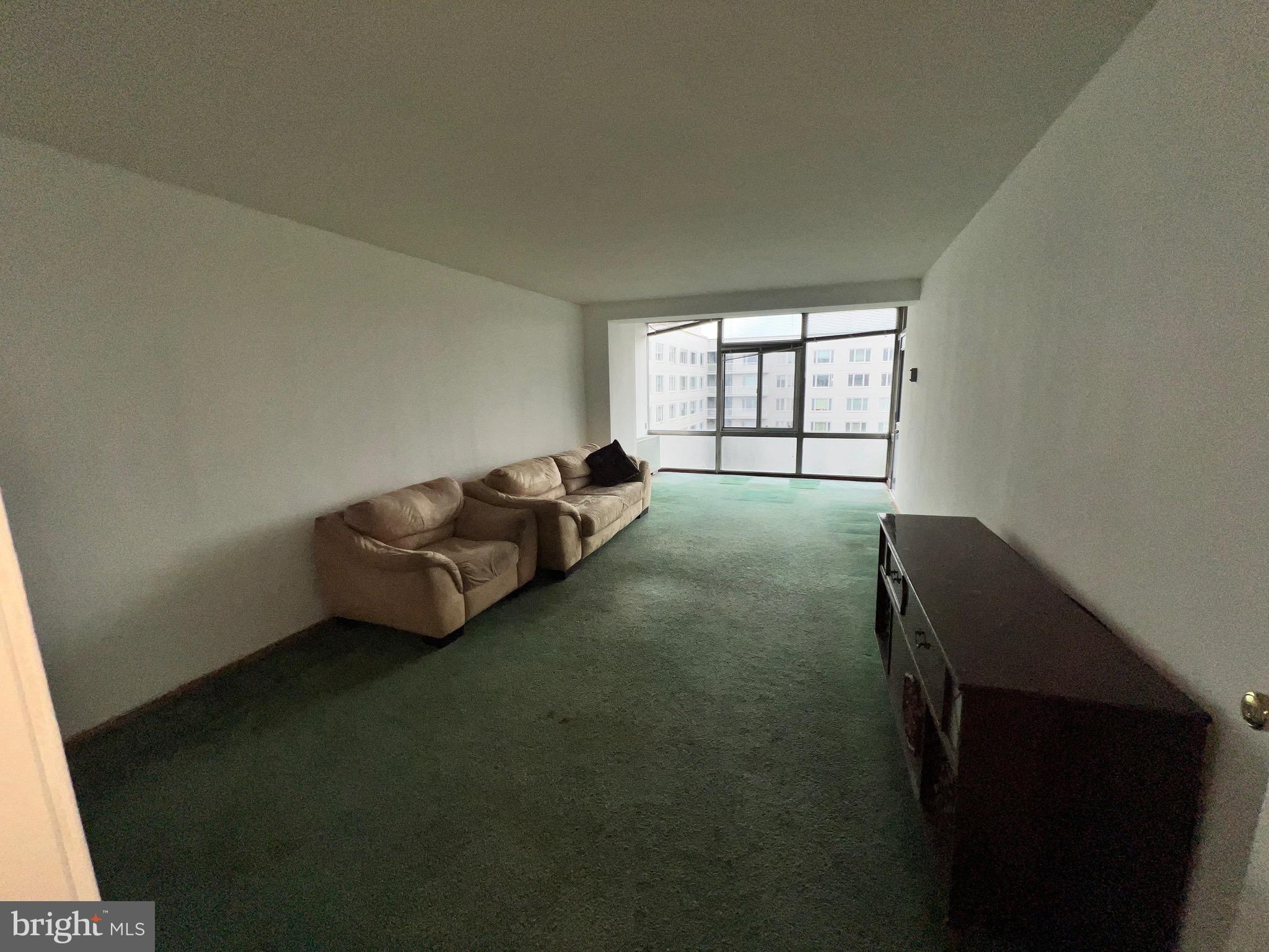 730 24th Street Northwest, Unit 703 Washington, DC 20037 - Photo 7 of 10 a room with a bed and a window