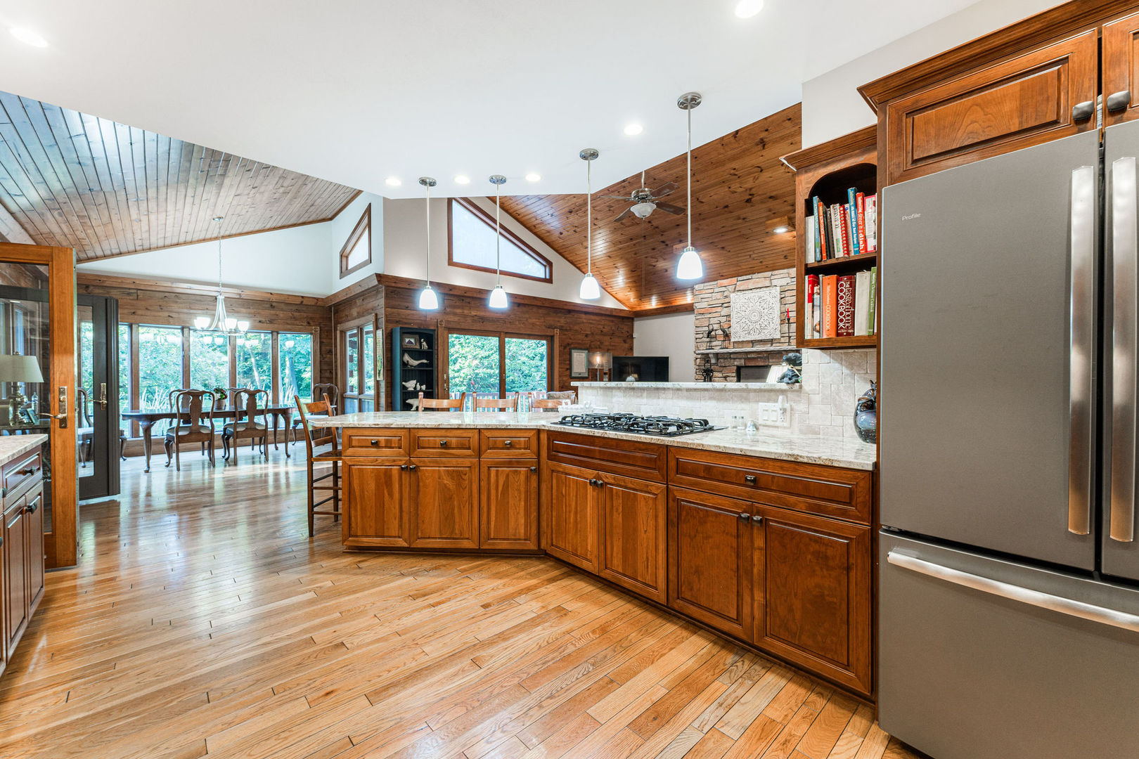 4060 Old State Road Kirkland, IL 60146 - Photo 13 of 51 a kitchen with stainless steel appliances granite countertop a lot of counter space and wooden floors