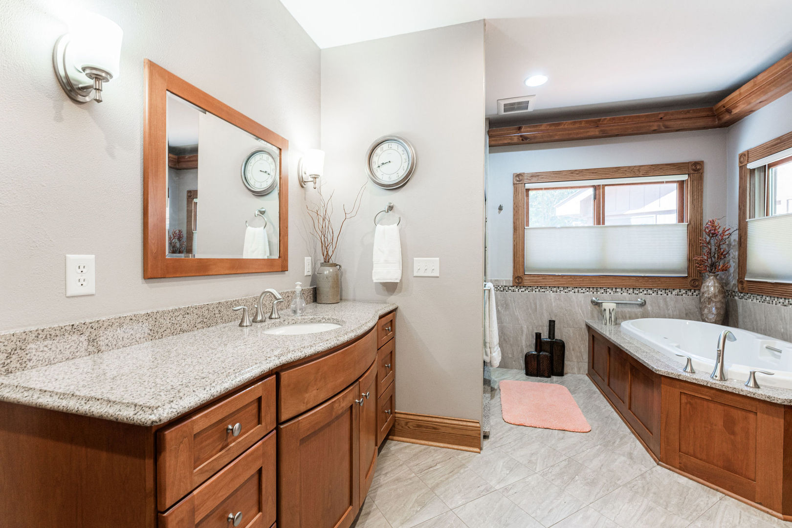 4060 Old State Road Kirkland, IL 60146 - Photo 18 of 51 a bathroom with a granite countertop sink mirror and a bathtub