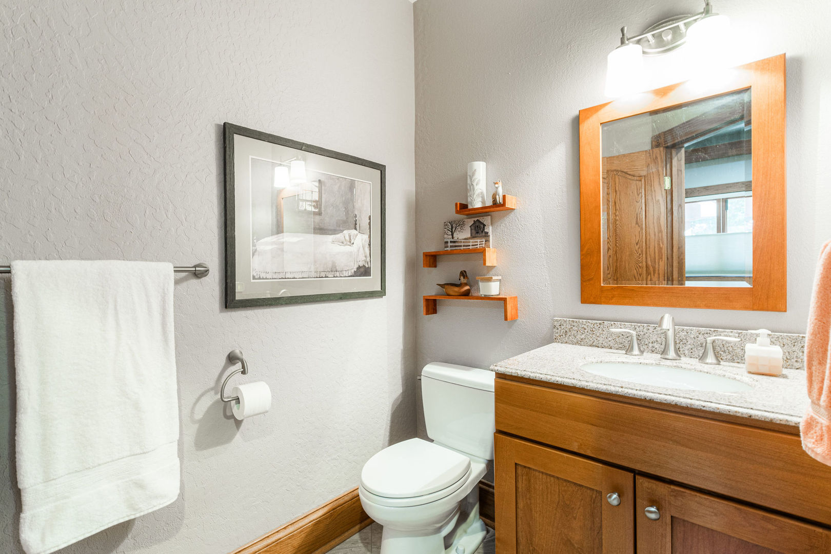 4060 Old State Road Kirkland, IL 60146 - Photo 19 of 51 a bathroom with a toilet sink and mirror