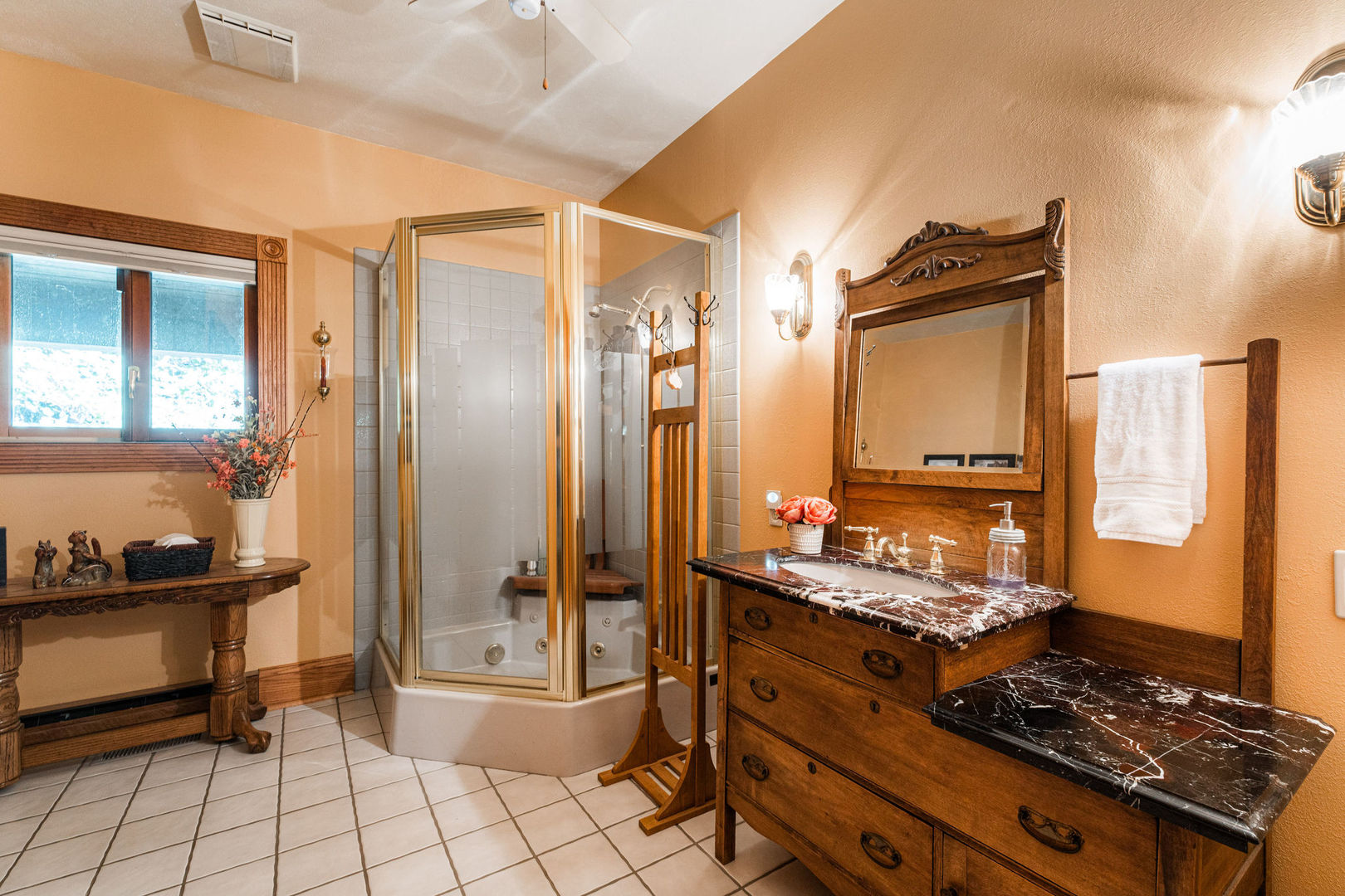 4060 Old State Road Kirkland, IL 60146 - Photo 22 of 51 a bathroom with a mirror and a sink