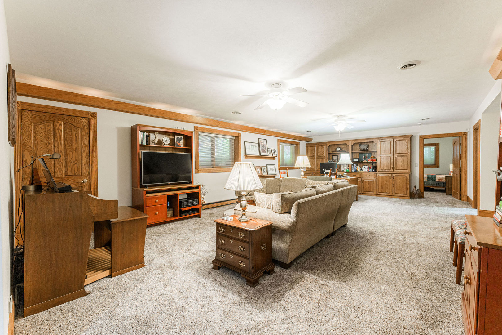 4060 Old State Road Kirkland, IL 60146 - Photo 25 of 51 a living room with furniture and a flat screen tv
