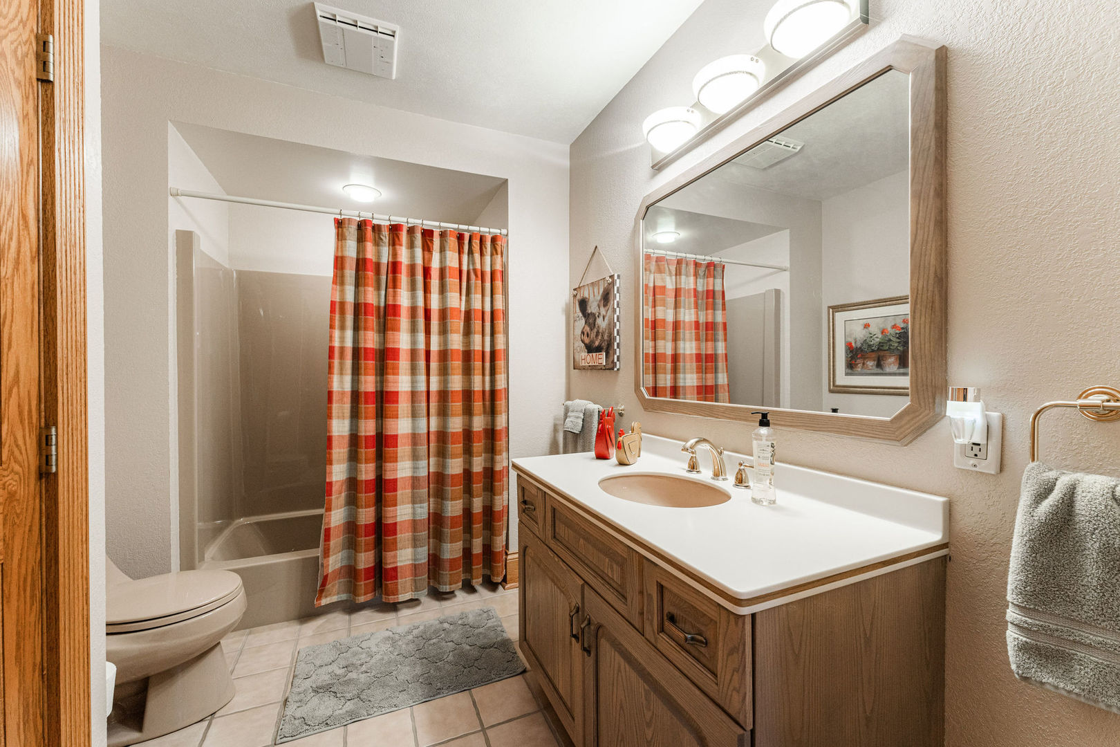 4060 Old State Road Kirkland, IL 60146 - Photo 28 of 51 a bathroom with a sink toilet double vanity and shower