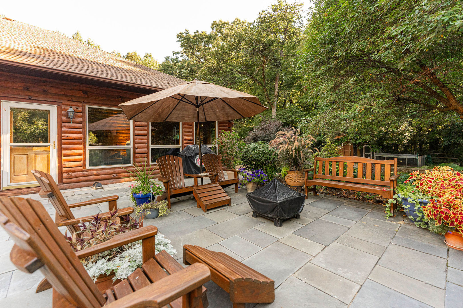 4060 Old State Road Kirkland, IL 60146 - Photo 31 of 51 a backyard of a house with seating space