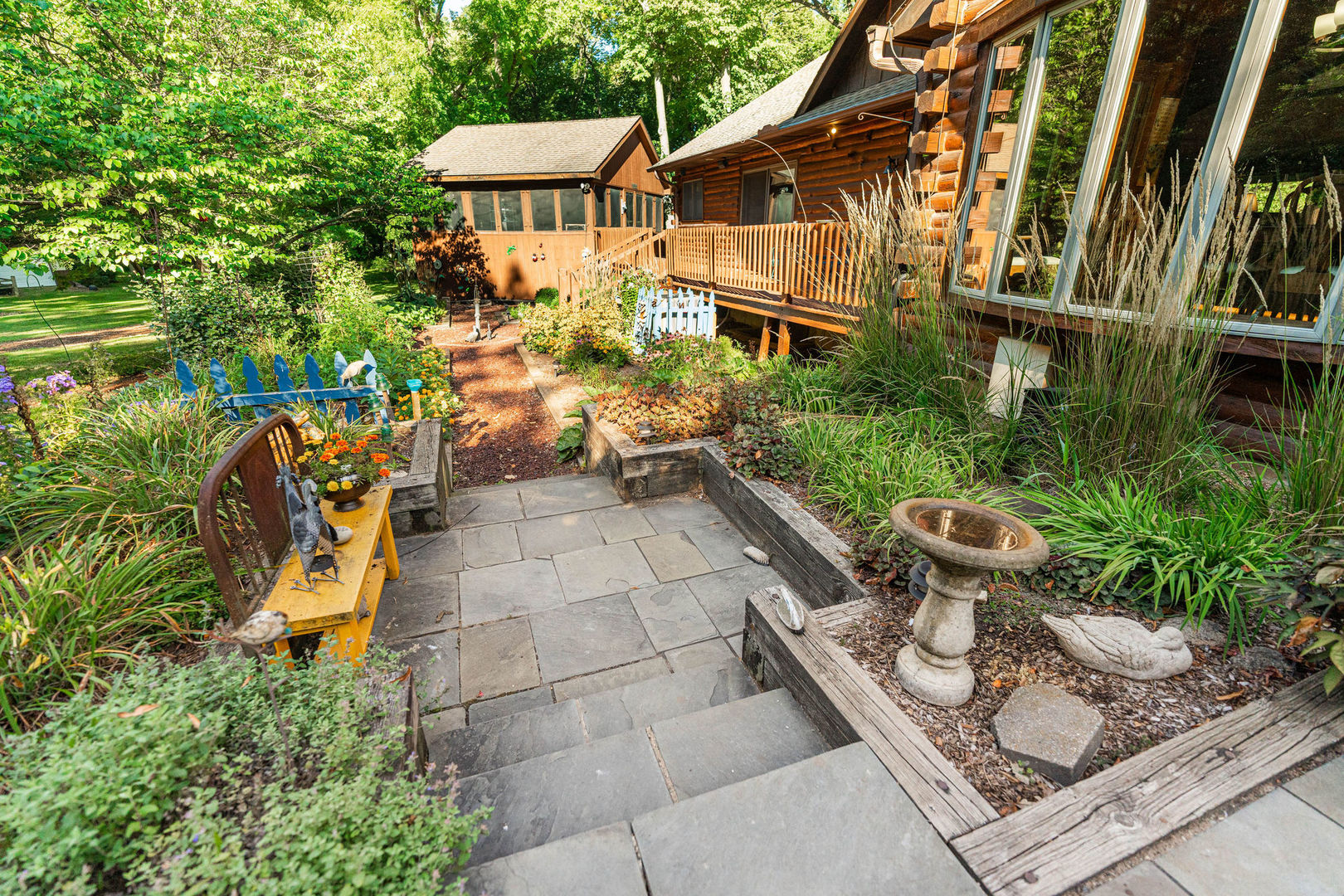 4060 Old State Road Kirkland, IL 60146 - Photo 35 of 51 a view of a chair and tables in the backyard