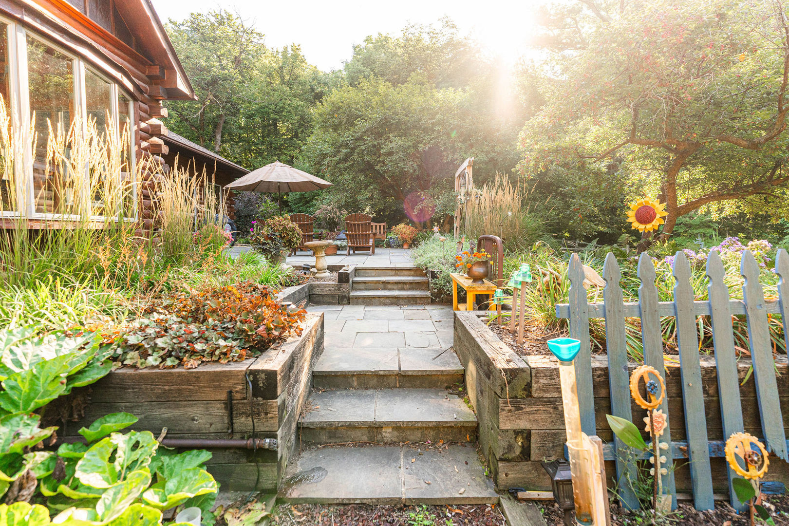 4060 Old State Road Kirkland, IL 60146 - Photo 36 of 51 a view of a patio with table and chairs and potted plants