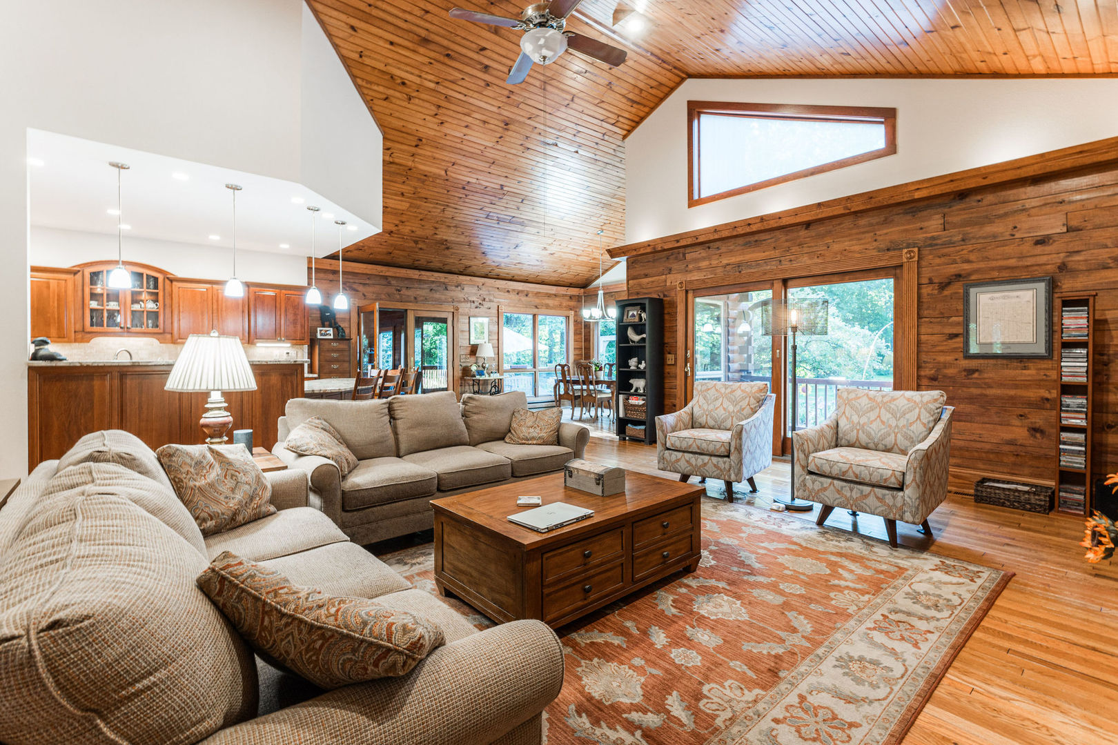 4060 Old State Road Kirkland, IL 60146 - Photo 7 of 51 a living room with furniture a rug kitchen view and a large window
