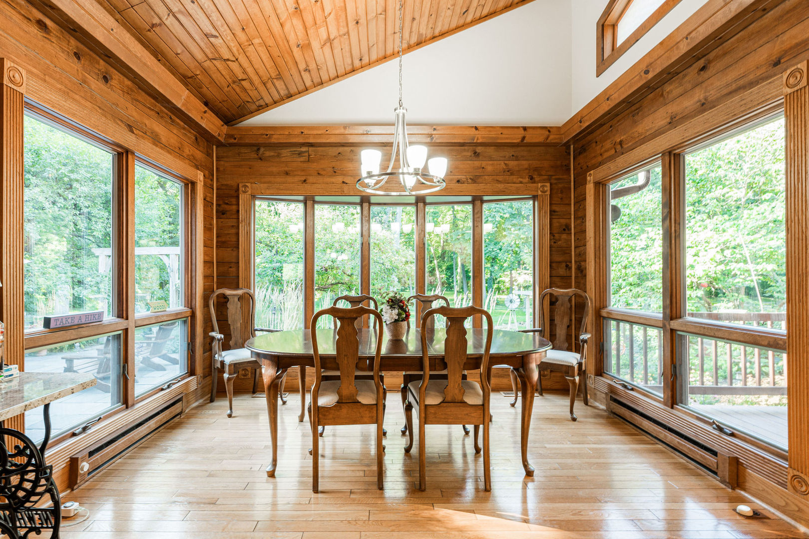 4060 Old State Road Kirkland, IL 60146 - Photo 9 of 51 a view of a dining room with furniture window and wooden floor
