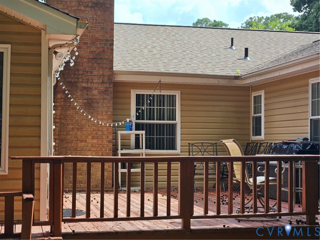 107 Tudor Road Colonial Heights, VA 23834 - Photo 13 of 13 Spacious outdoor deck featuring wood railing and f