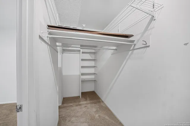 a white toilet sitting next to a bath tub