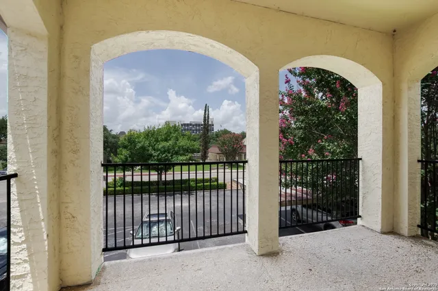 a view of a large window with an outdoor space