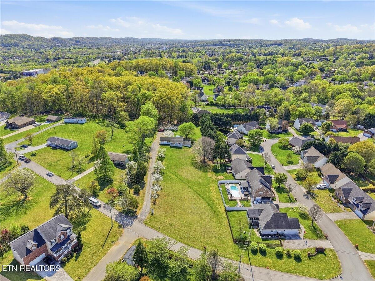 7709 Morris Road Knoxville, TN 37938 - Photo 44 of 52 an aerial view of residential houses with outdoor space and swimming pool