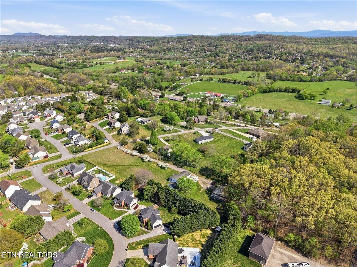 7709 Morris Road Knoxville, TN 37938 - Photo 50 of 52 an aerial view of residential houses with outdoor space and trees