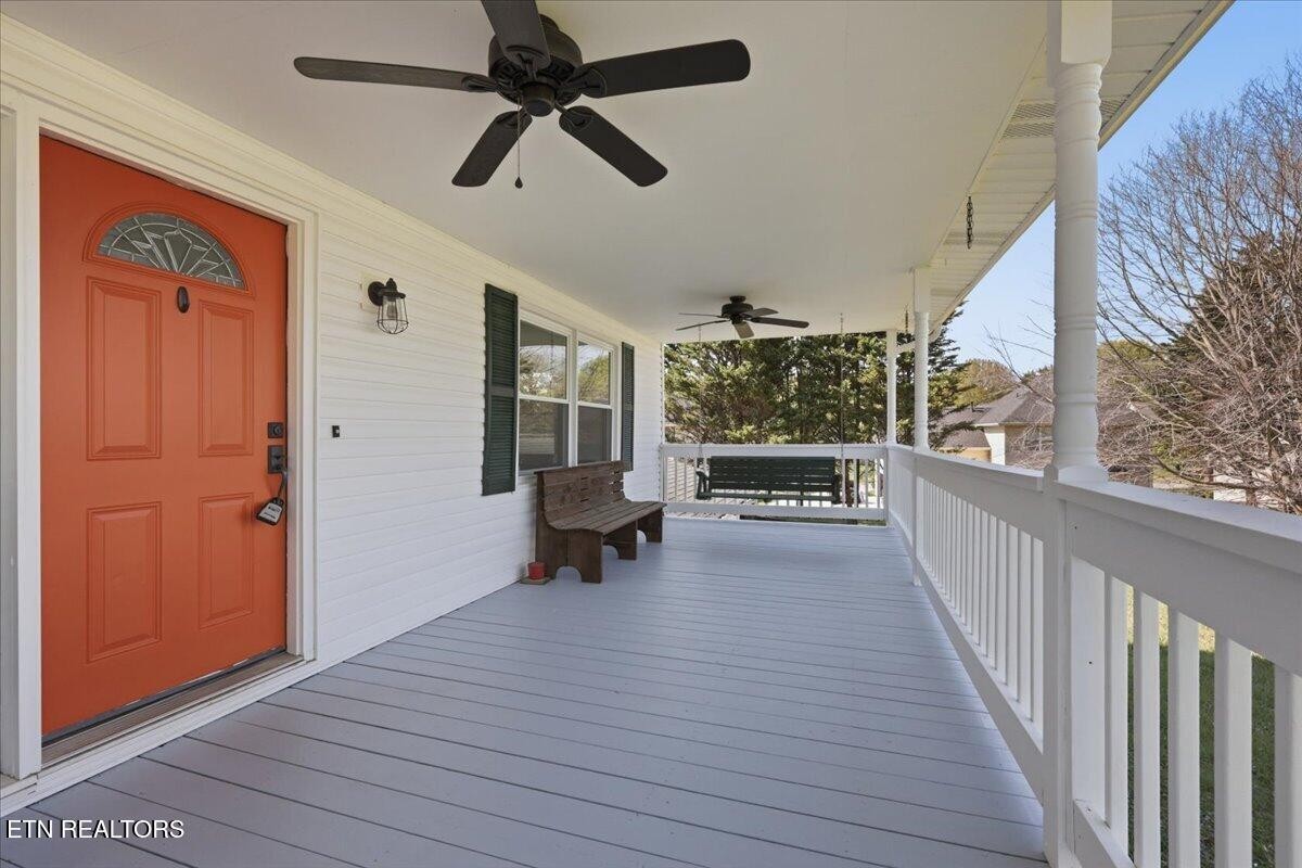 7709 Morris Road Knoxville, TN 37938 - Photo 7 of 52 a view of outdoor space with wooden floor and windows