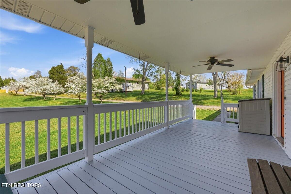 7709 Morris Road Knoxville, TN 37938 - Photo 8 of 52 a view of a porch and wooden floor