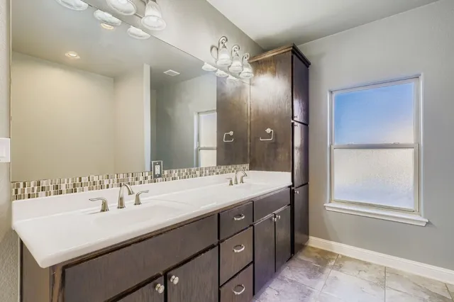 a bathroom with a tub and a shower