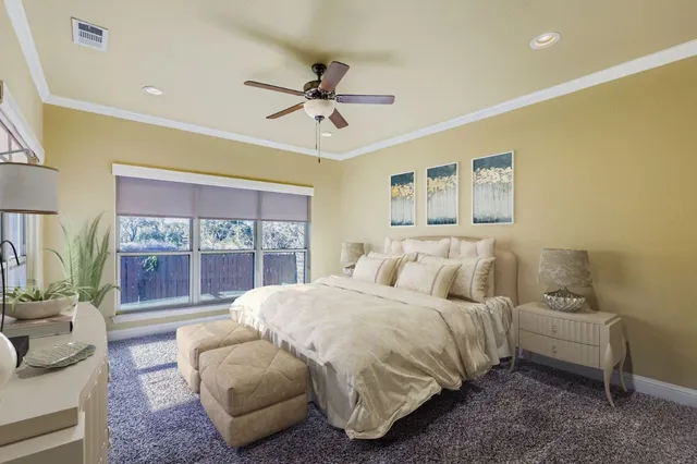 a large kitchen with stainless steel appliances lots of counter space and a sink