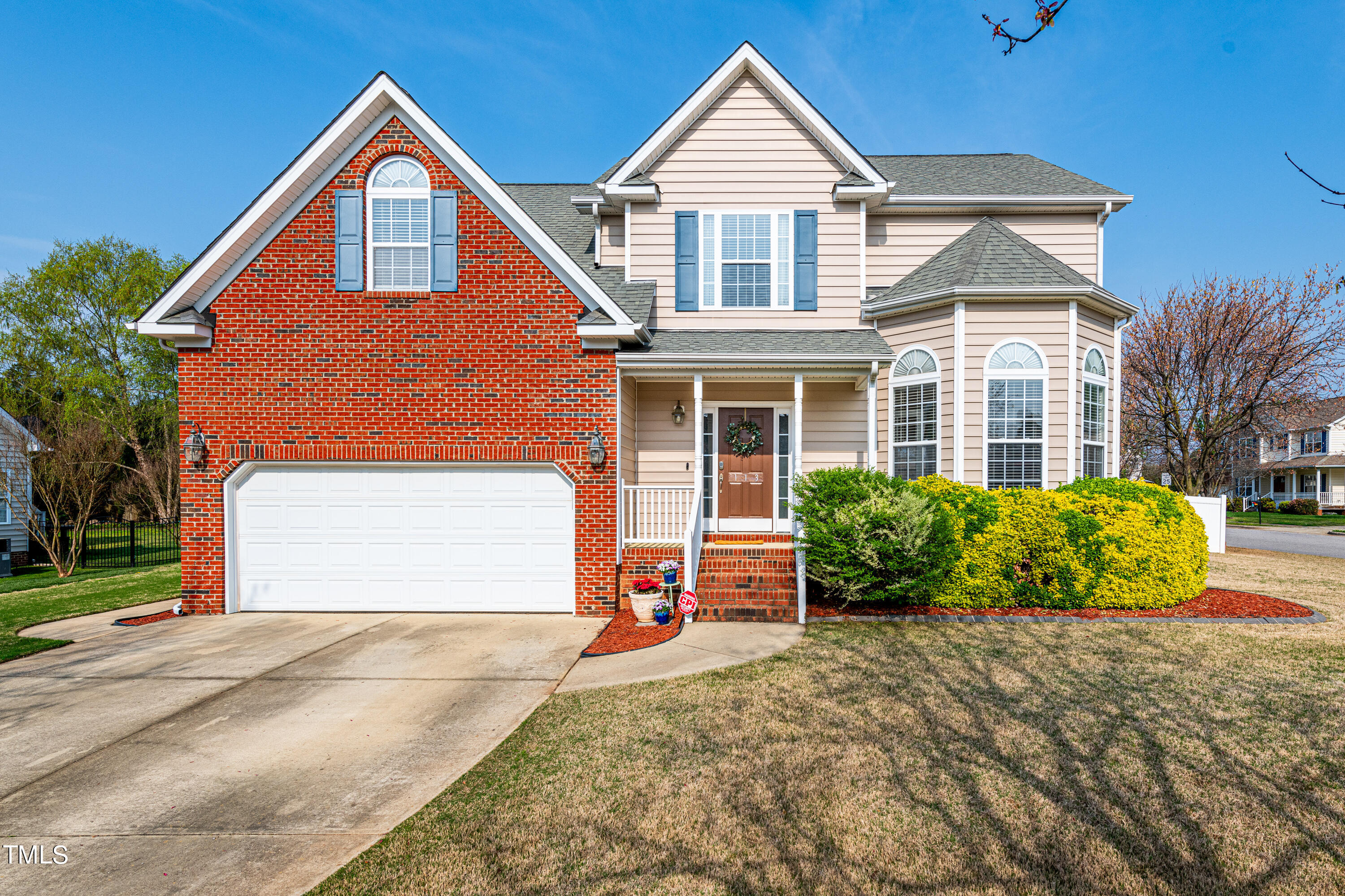 113 Sugarloaf Way Raleigh, NC 27603 - Photo 1 of 42 a front view of a house with a yard