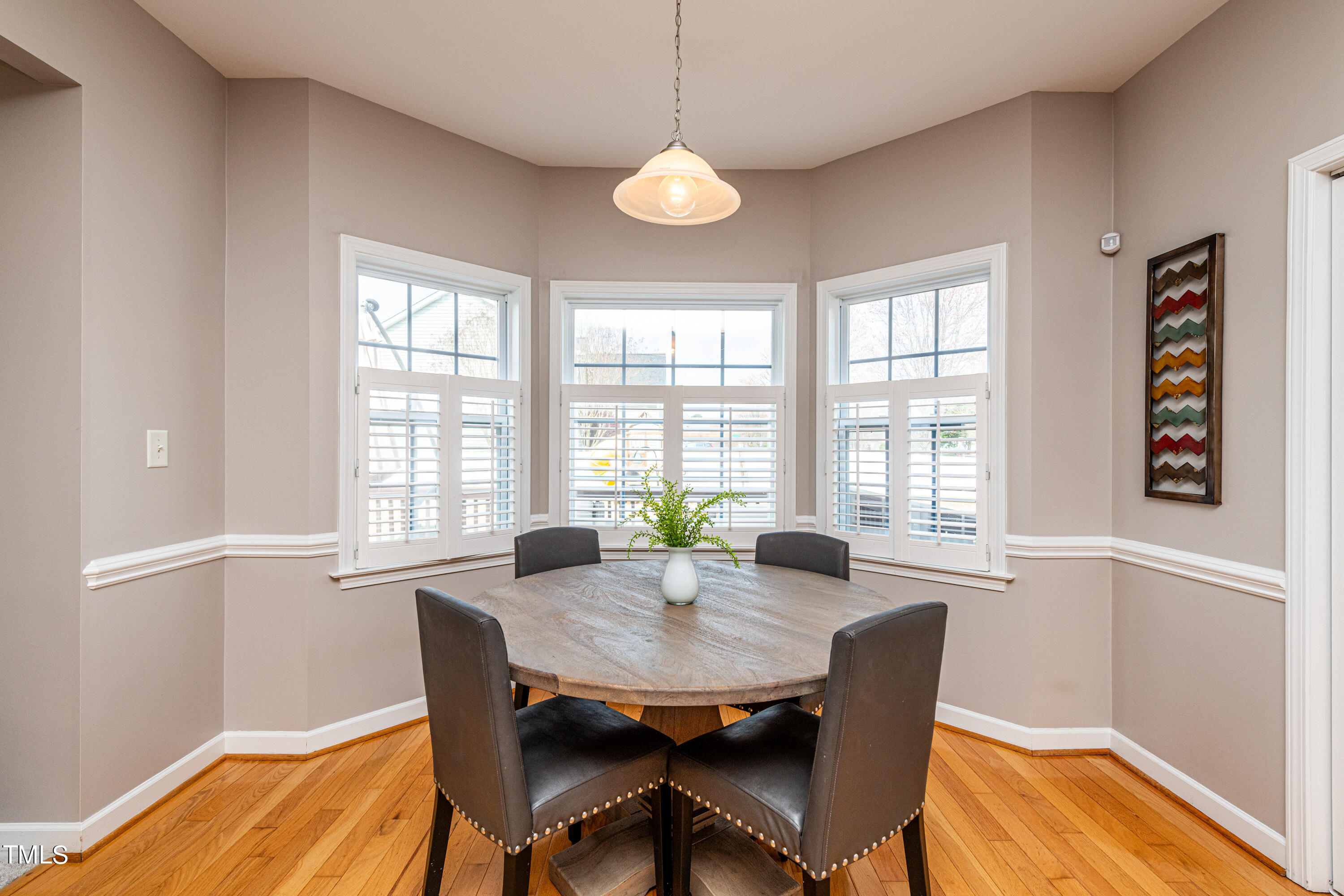 113 Sugarloaf Way Raleigh, NC 27603 - Photo 19 of 42 a view of a dining room with furniture window and outside view