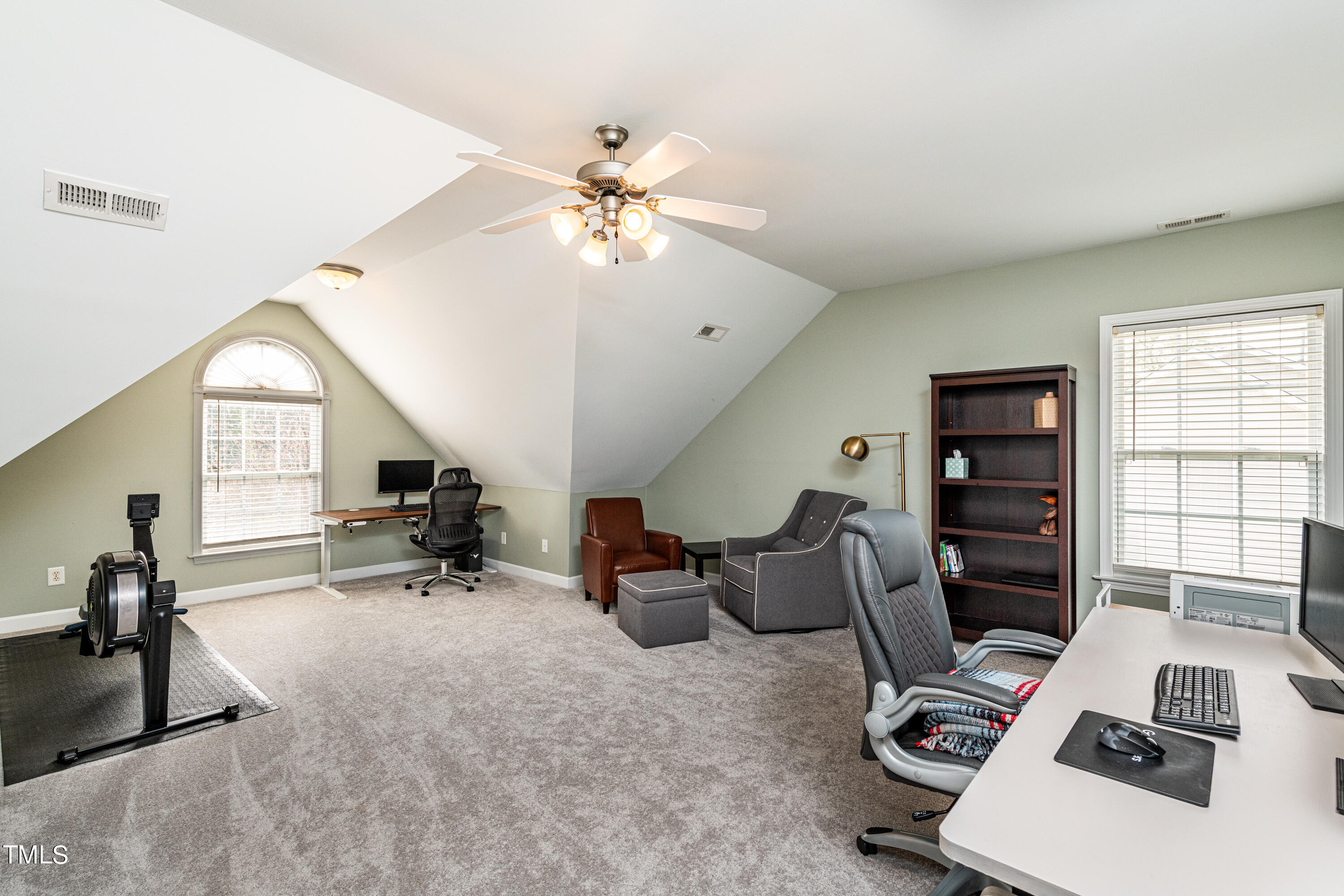 113 Sugarloaf Way Raleigh, NC 27603 - Photo 32 of 42 a room with furniture and a window