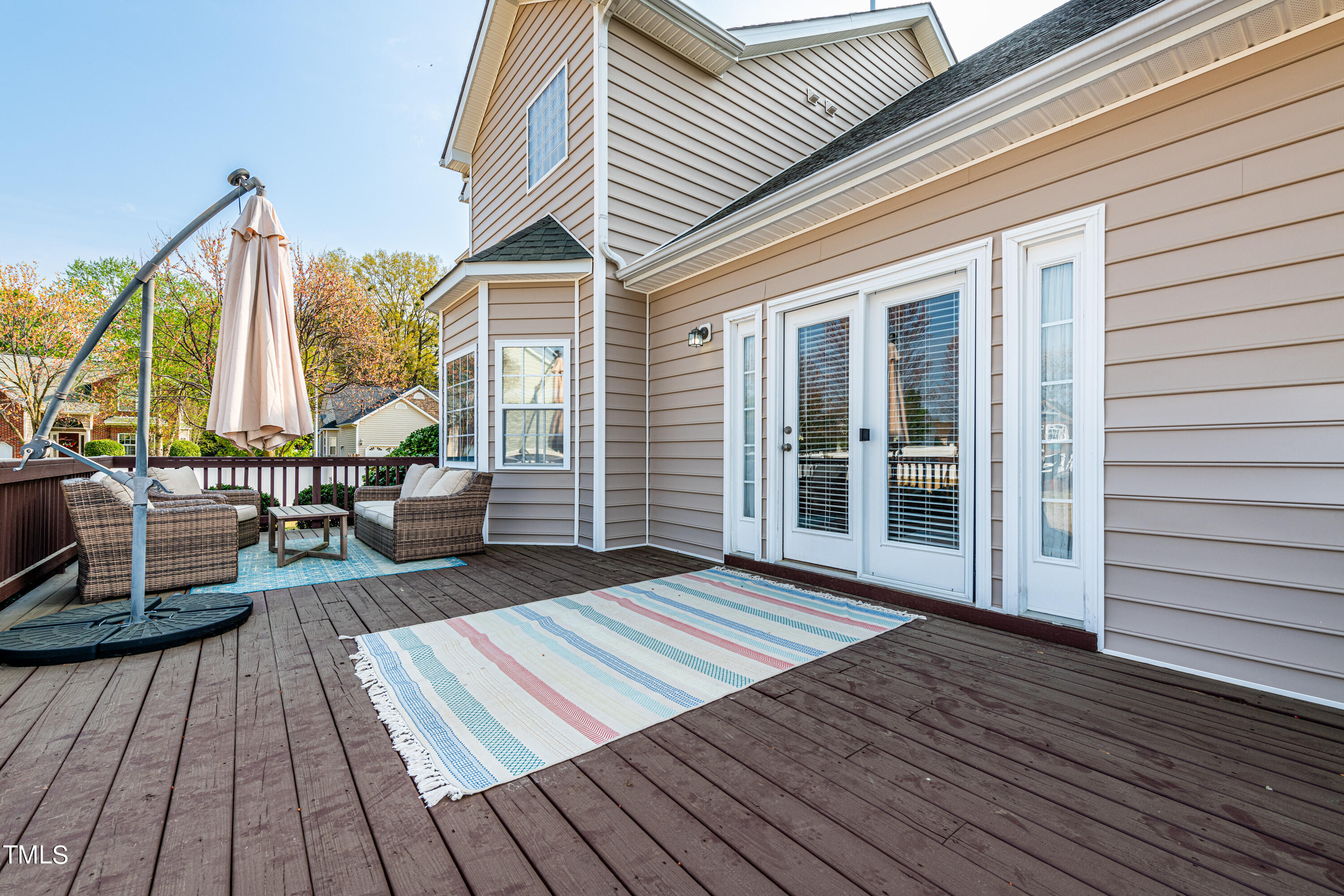 113 Sugarloaf Way Raleigh, NC 27603 - Photo 34 of 42 a view of a patio with wooden floor
