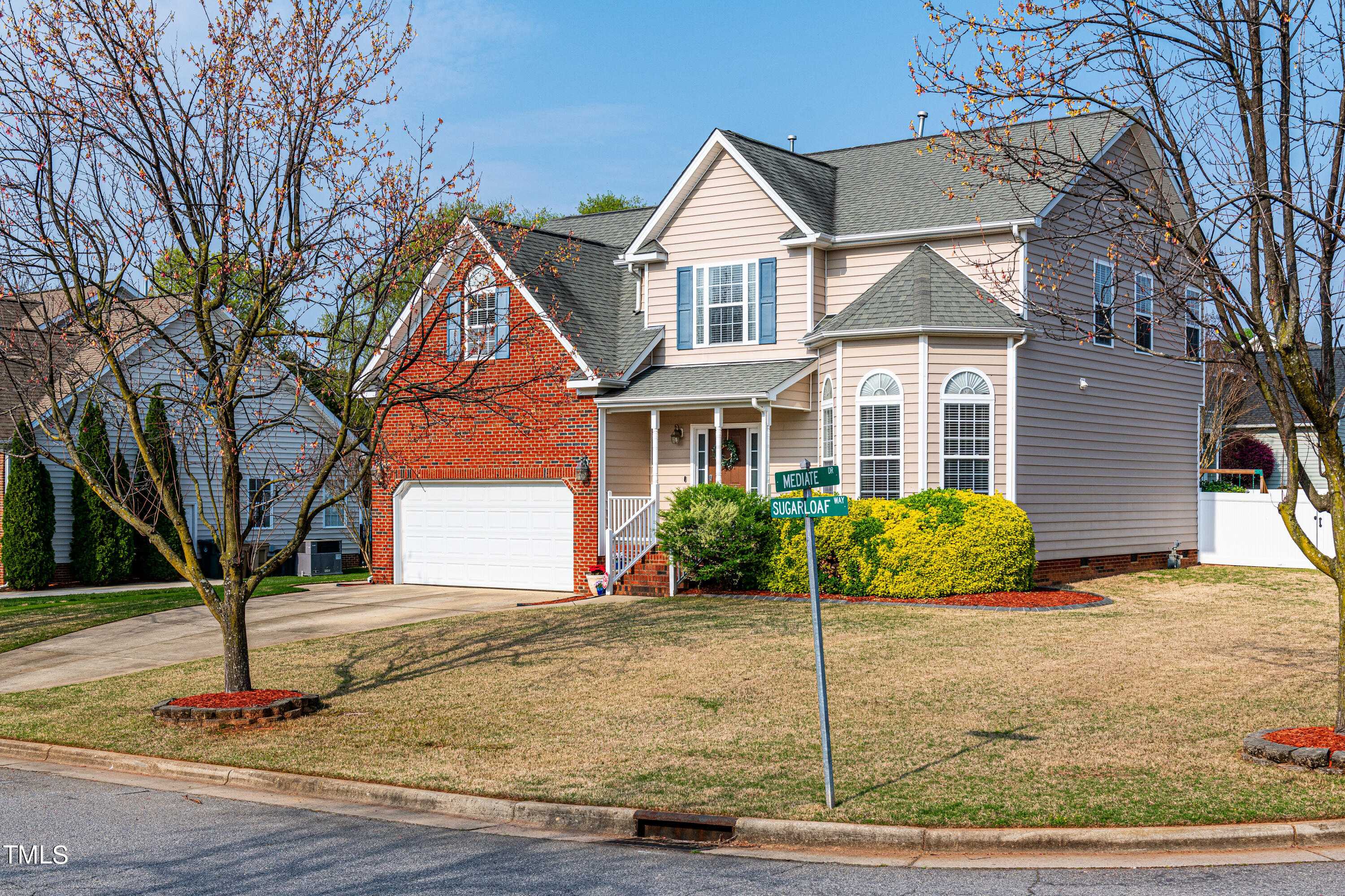 113 Sugarloaf Way Raleigh, NC 27603 - Photo 42 of 42 a front view of a house with garden