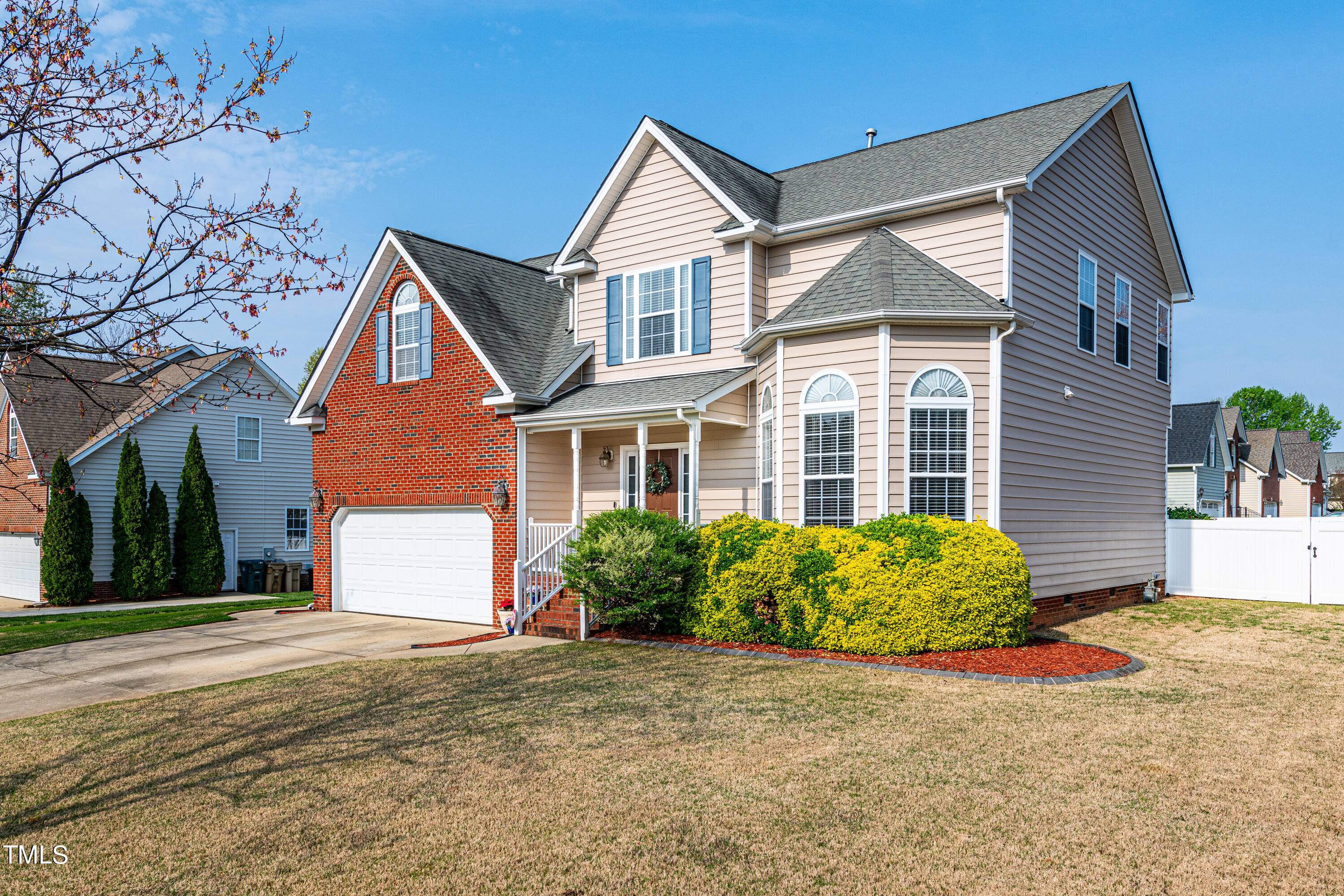 113 Sugarloaf Way Raleigh, NC 27603 - Photo 5 of 42 front view of a house with a yard