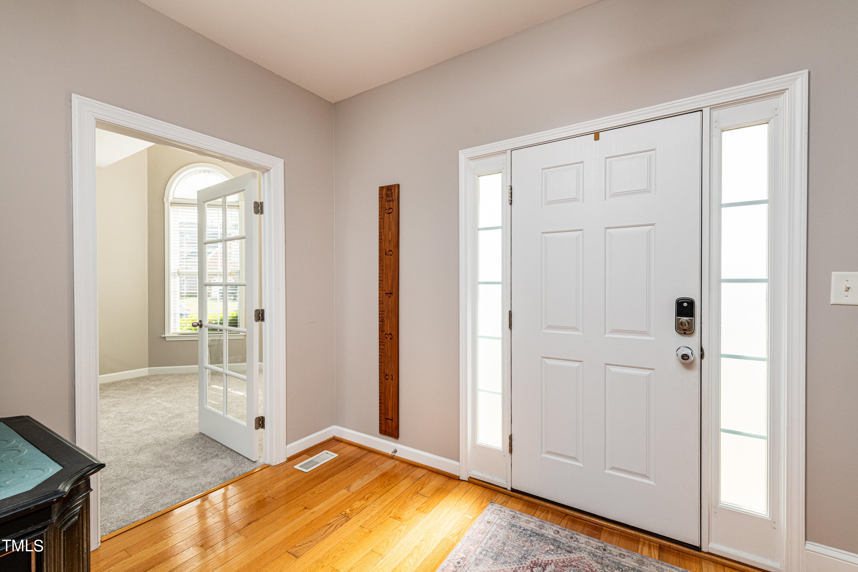 113 Sugarloaf Way Raleigh, NC 27603 - Photo 6 of 42 a view of an empty room and window