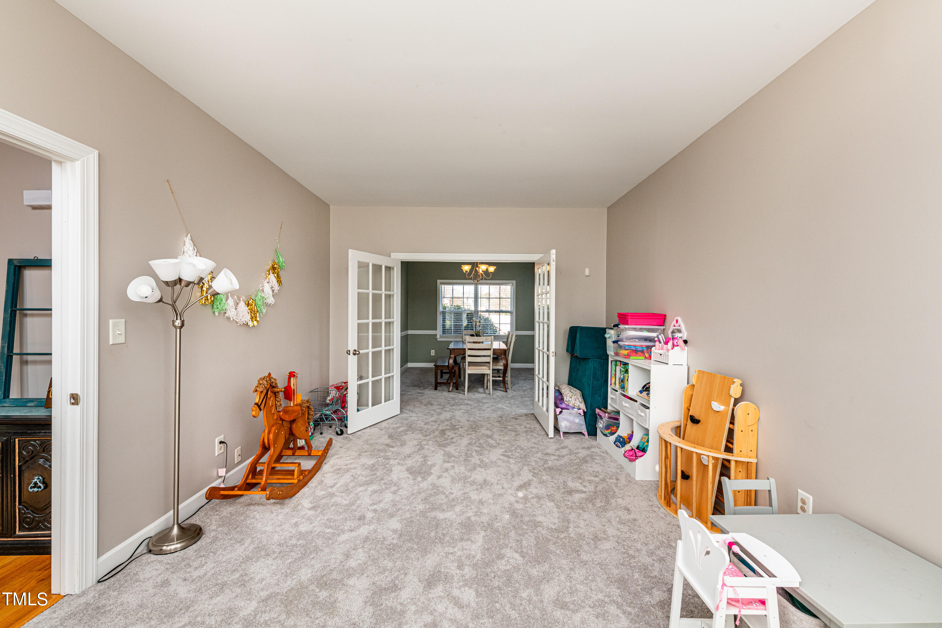 113 Sugarloaf Way Raleigh, NC 27603 - Photo 9 of 42 a view of a room with gym equipment