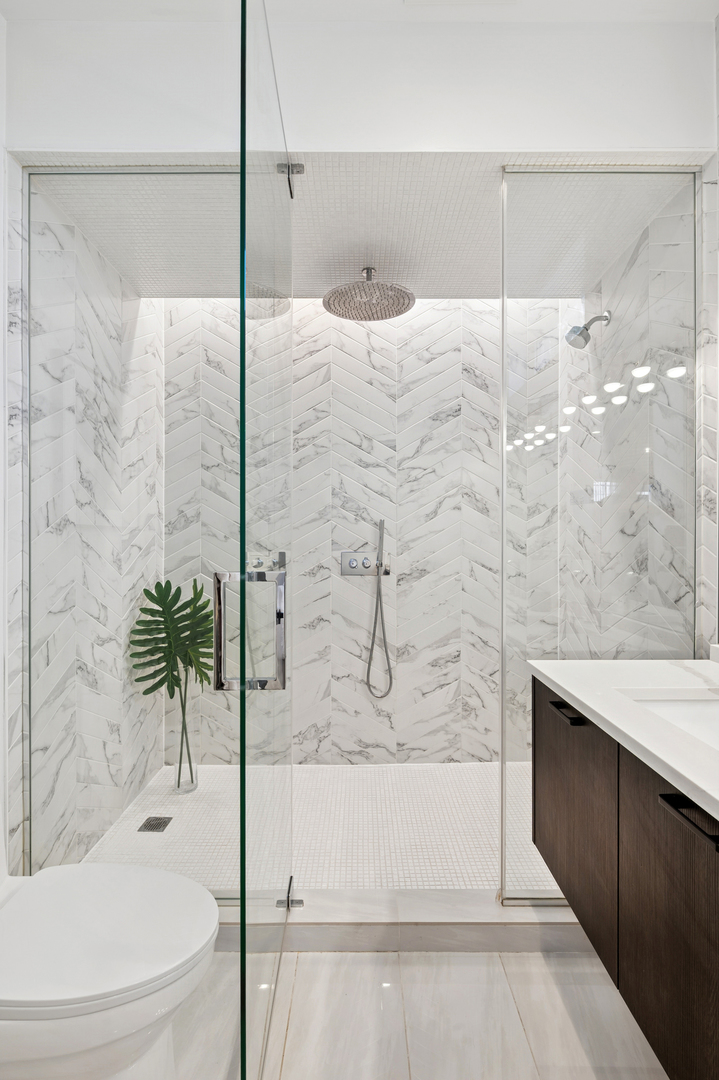 2237 North Hoyne Avenue, Unit 3N Chicago, IL 60647 - Photo 12 of 22 a bathroom with a bathtub and a shower