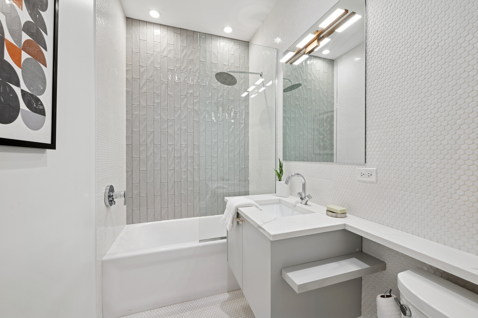 2237 North Hoyne Avenue, Unit 3N Chicago, IL 60647 - Photo 14 of 22 a bathroom with a sink a toilet and shower