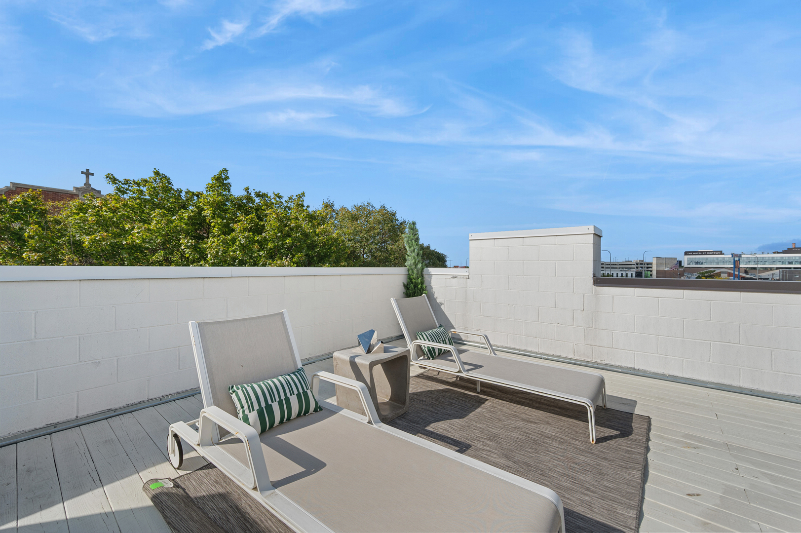 2237 North Hoyne Avenue, Unit 3N Chicago, IL 60647 - Photo 18 of 22 a view of a chairs and table on the terrace