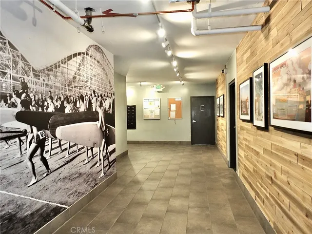 a living room with lots of books