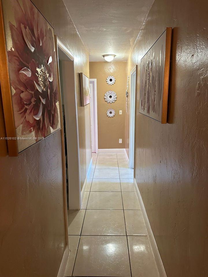 14821 Pierce Street Miami, FL 33176 - Photo 4 of 5 a view of a hallway