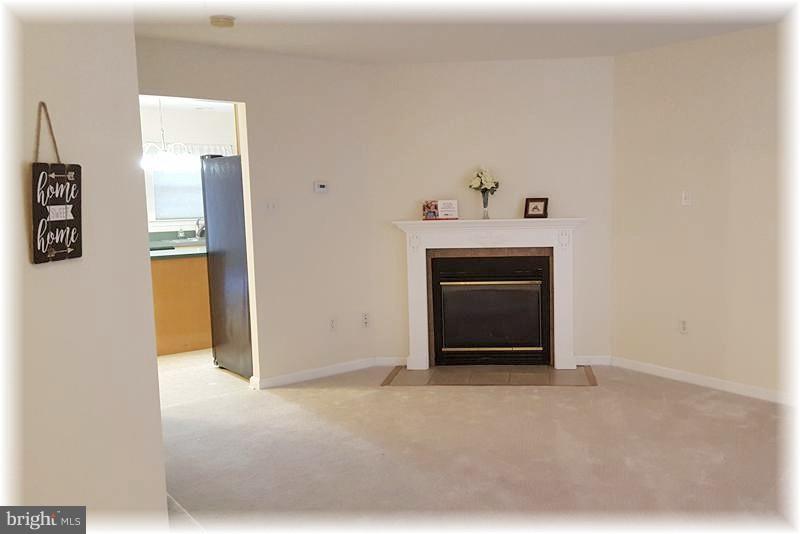 721 Shallow Ridge Court Abingdon, MD 21009 - Photo 3 of 28 Enjoy the comfort of a natural gas fireplace.