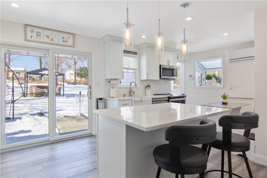 17 Mt Hope Road Mahopac, NY 10541 - Photo 1 of 1 Kitchen with sliding doors leading to the cement patio in the backyard.