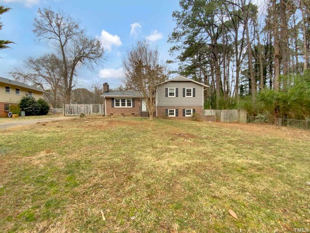 a view of a street with houses