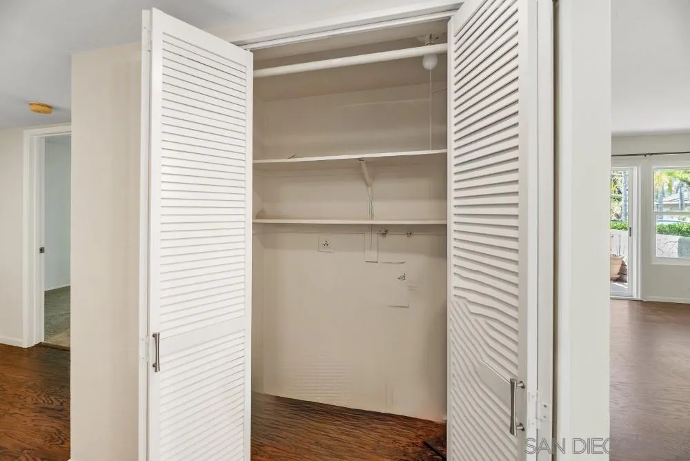 219 Diamond Way, Unit 115 Vista, CA 92083 - Photo 20 of 36 a view of walk in closet with empty room