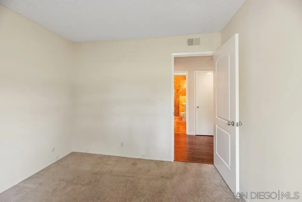 219 Diamond Way, Unit 115 Vista, CA 92083 - Photo 29 of 36 an empty room and a bathroom