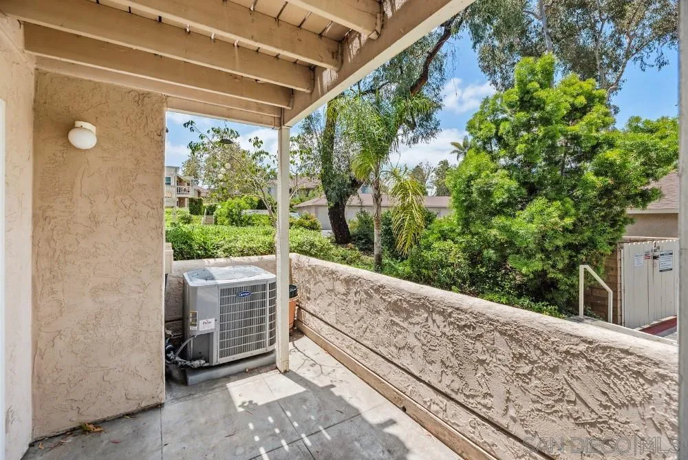 219 Diamond Way, Unit 115 Vista, CA 92083 - Photo 9 of 36 a view of a room with windows and tree