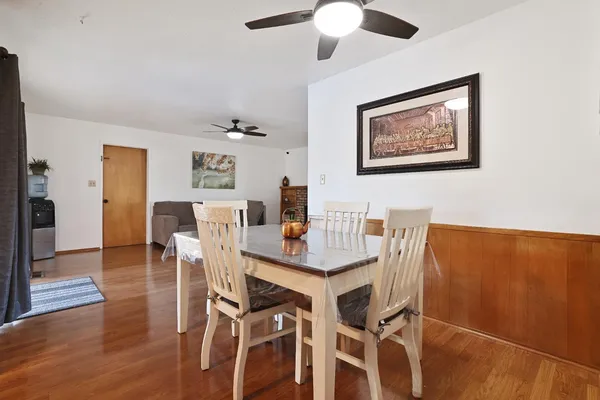a kitchen with granite countertop sink cabinets and stainless steel appliances