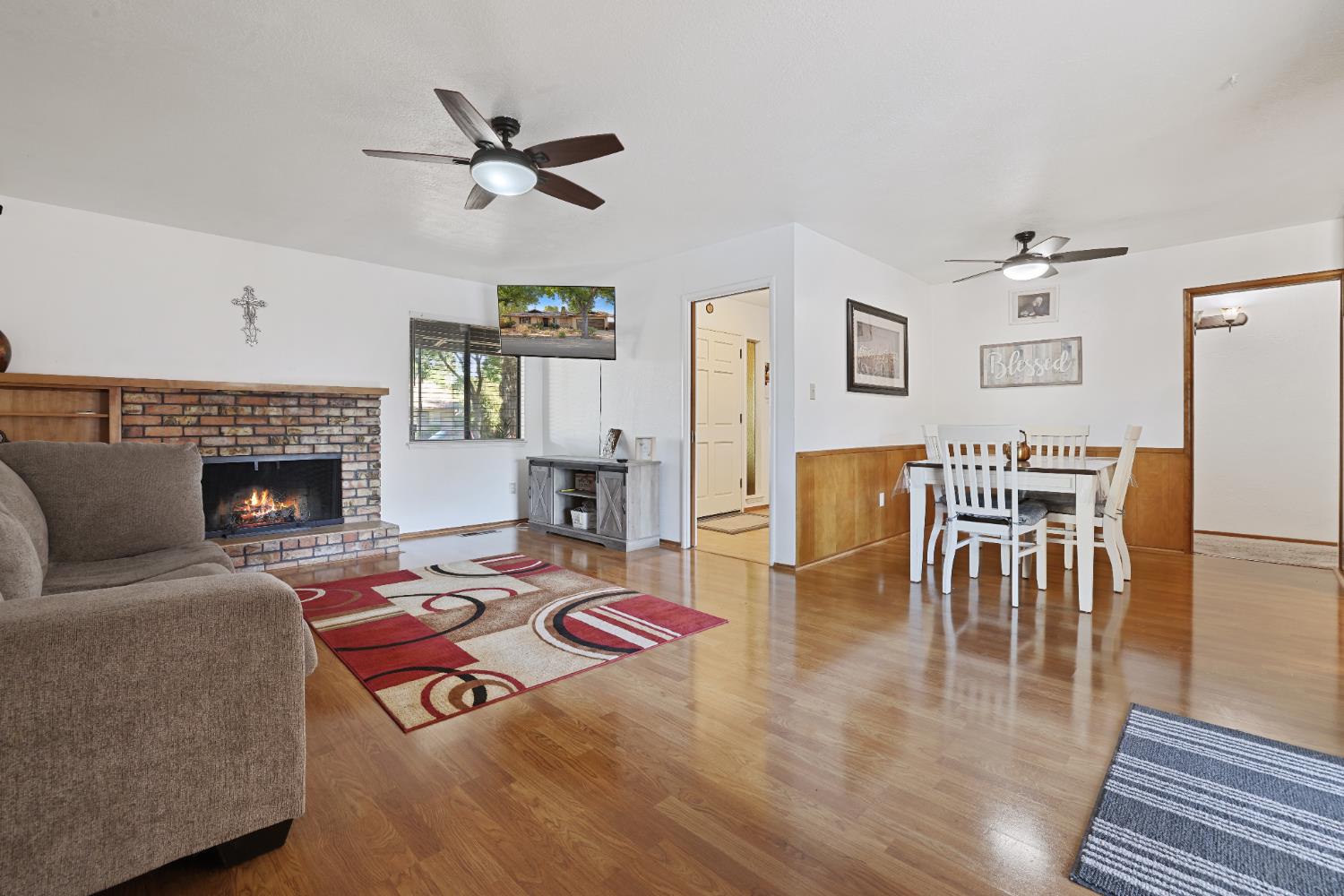 1608 Kruger Drive Modesto, CA 95355 - Photo 28 of 35 a living room with furniture and a fireplace