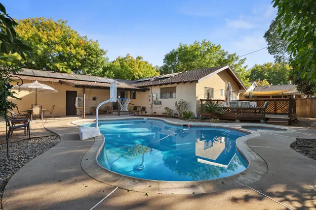 a view of outdoor space yard and swimming pool
