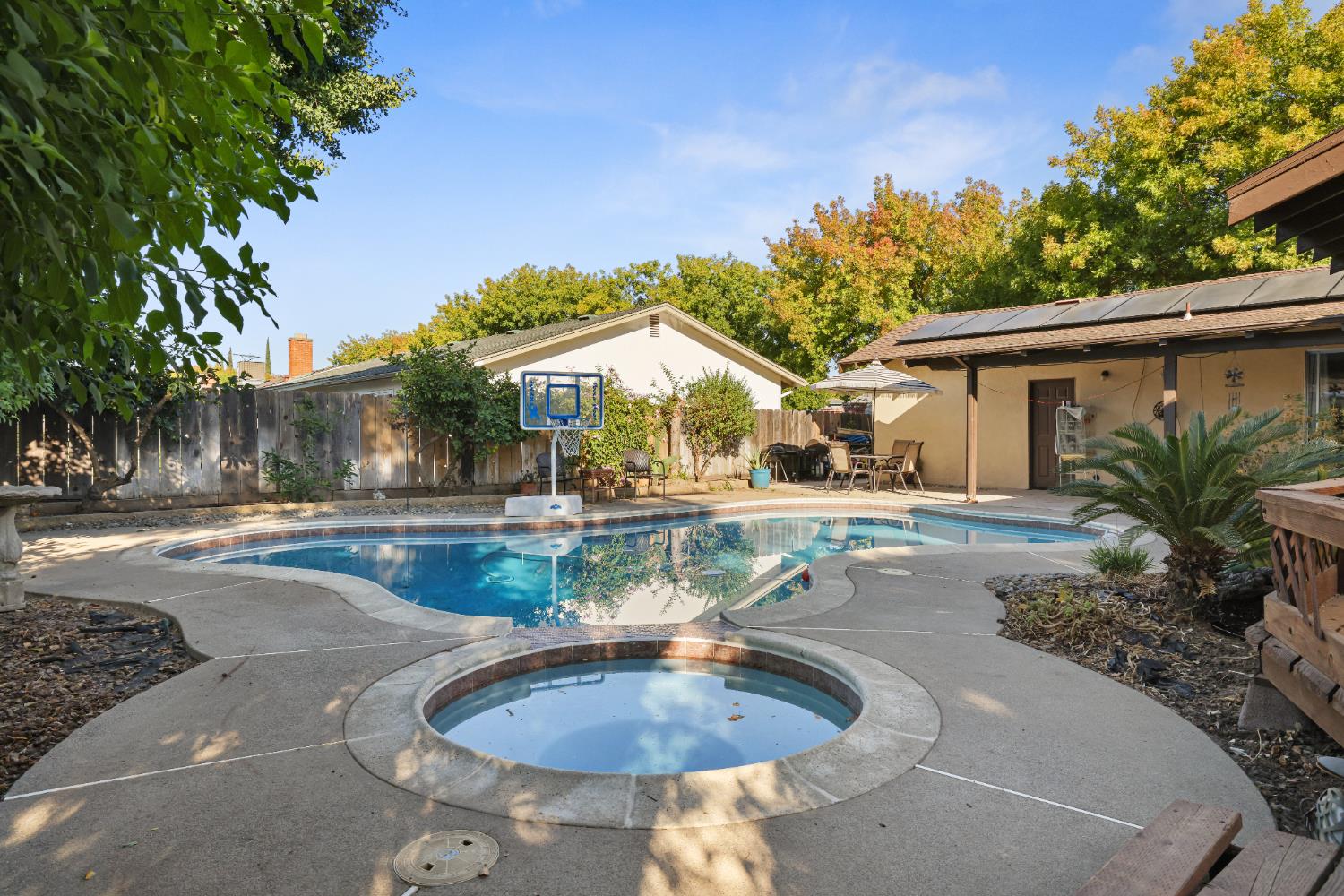1608 Kruger Drive Modesto, CA 95355 - Photo 32 of 35 a view of outdoor space yard and swimming pool