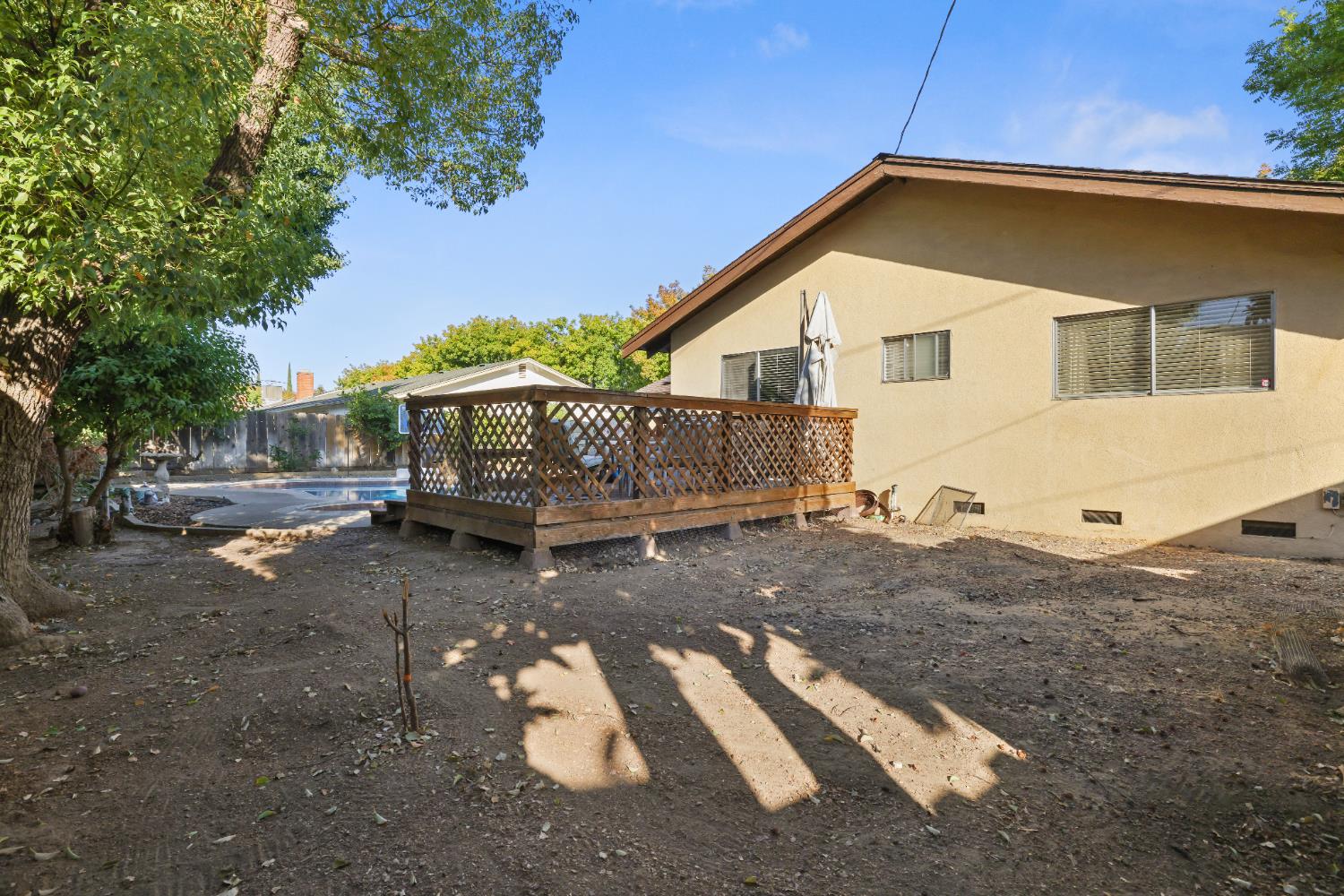 1608 Kruger Drive Modesto, CA 95355 - Photo 33 of 35 a view of a house with a yard